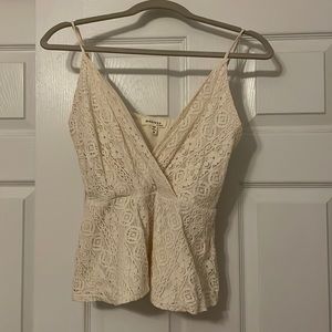 Lace tank top with adjustable straps. Size M